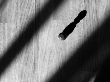 High angle view of shadow on table