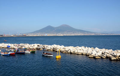 Scenic view of sea against clear blue sky