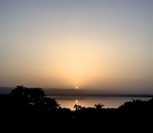 Scenic view of sea at sunset