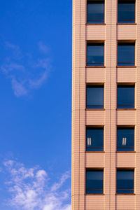 Low angle view of modern building against sky