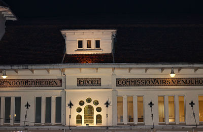 Low angle view of illuminated building at night