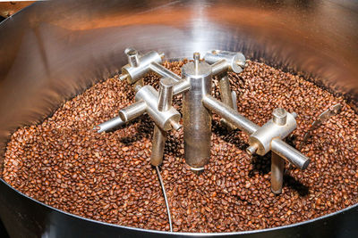 High angle view of coffee beans in container