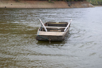High angle view of boat moored in lake