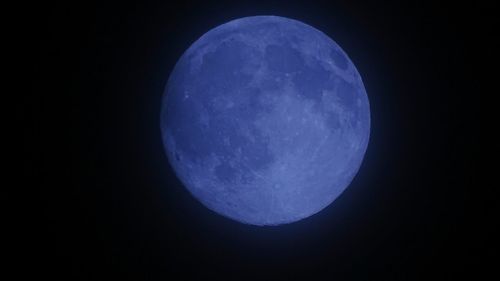 Low angle view of moon in sky