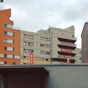 Low angle view of buildings in city against sky