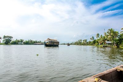 Scenic view of alleppey backwaters against sky