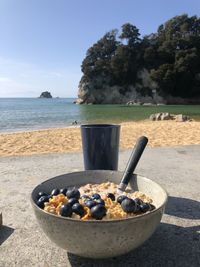 View of breakfast on table against sea