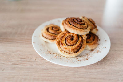 High angle view of cookies in plate on table