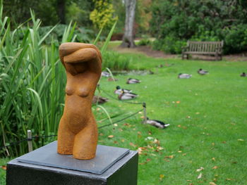 Stuffed toy on field in park