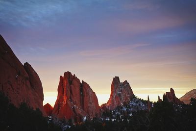 Panoramic view of rock formations against sky