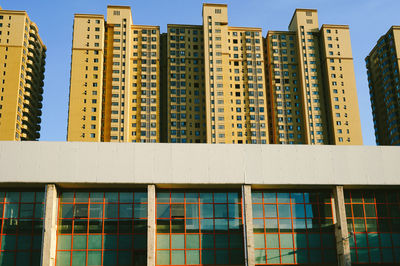 Low angle view of modern building against clear sky