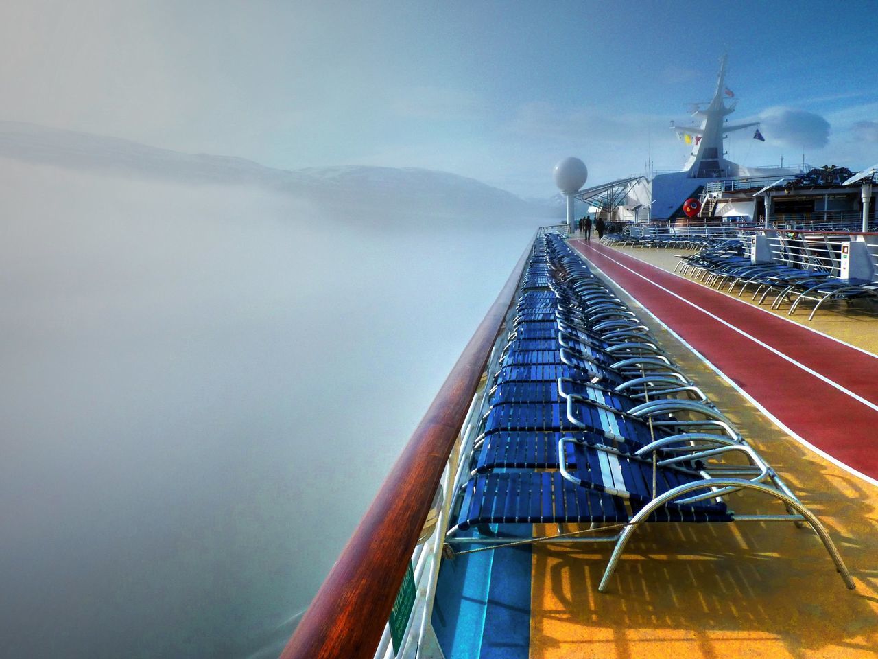 transportation, sky, mode of transport, nautical vessel, sea, mountain, cloud - sky, diminishing perspective, water, outdoors, cloud, nature, the way forward, scenics, day, travel, boat, tranquility, tranquil scene, beauty in nature