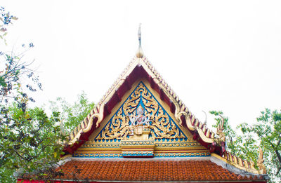 Low angle view of ornate building against clear sky