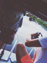 Man photographing car