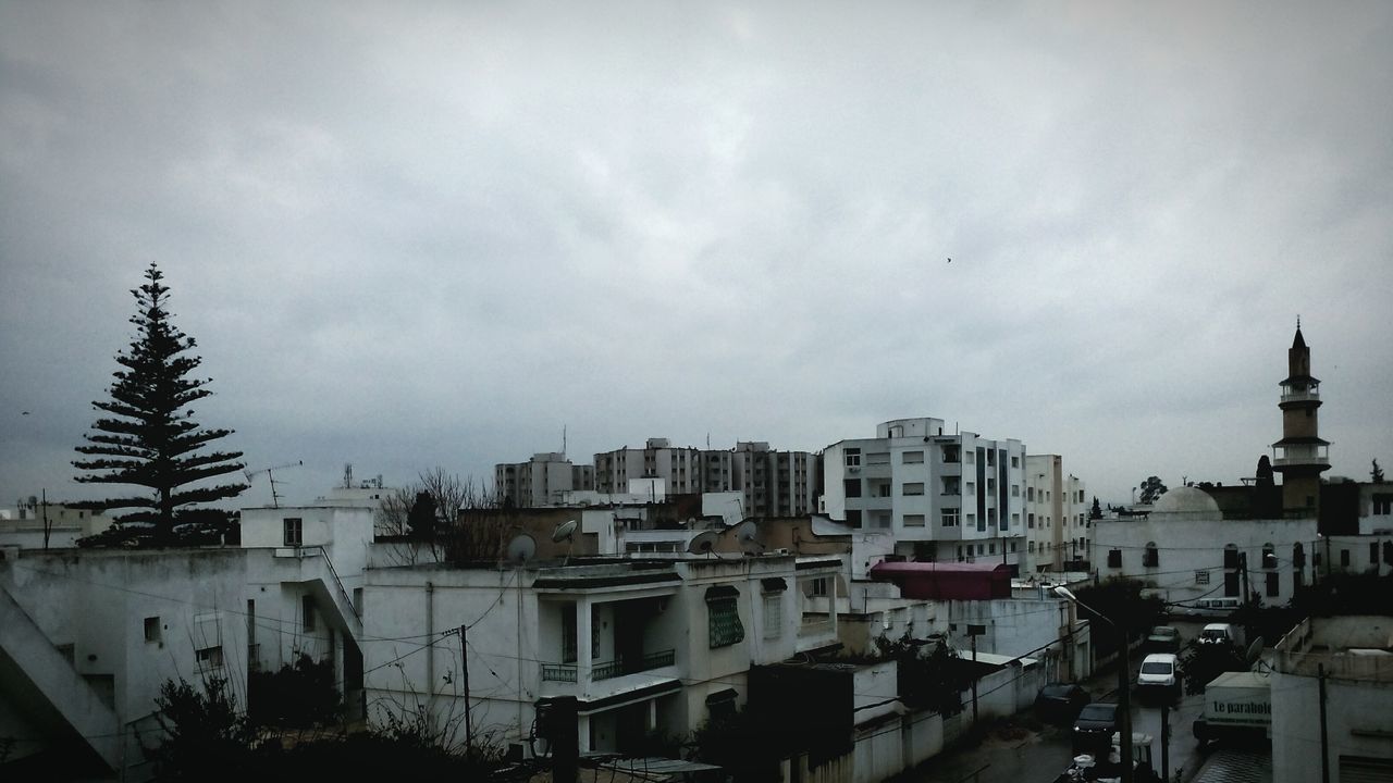 building exterior, architecture, built structure, sky, city, residential structure, residential building, cityscape, residential district, cloud - sky, building, cloudy, house, outdoors, day, cloud, no people, town, overcast, high angle view