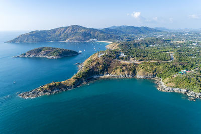 High angle view of bay and sea against sky