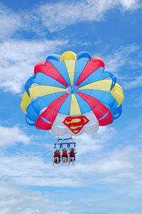 Low angle view of kite flying against sky