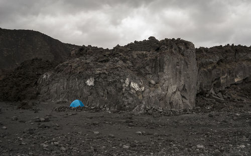 Tent on mountain against sky