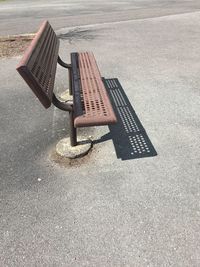 High angle view of empty bench in park