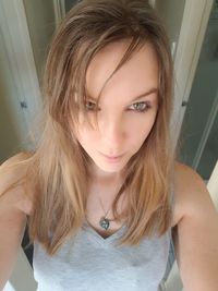 Portrait of beautiful woman at home