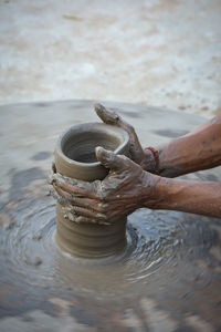 Man working in mud