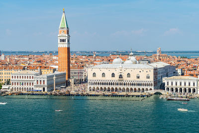 View of buildings by sea