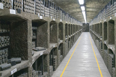 Collections of old wine bottles in wine cellars