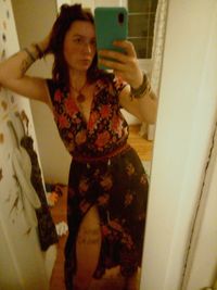 Portrait of woman photographing