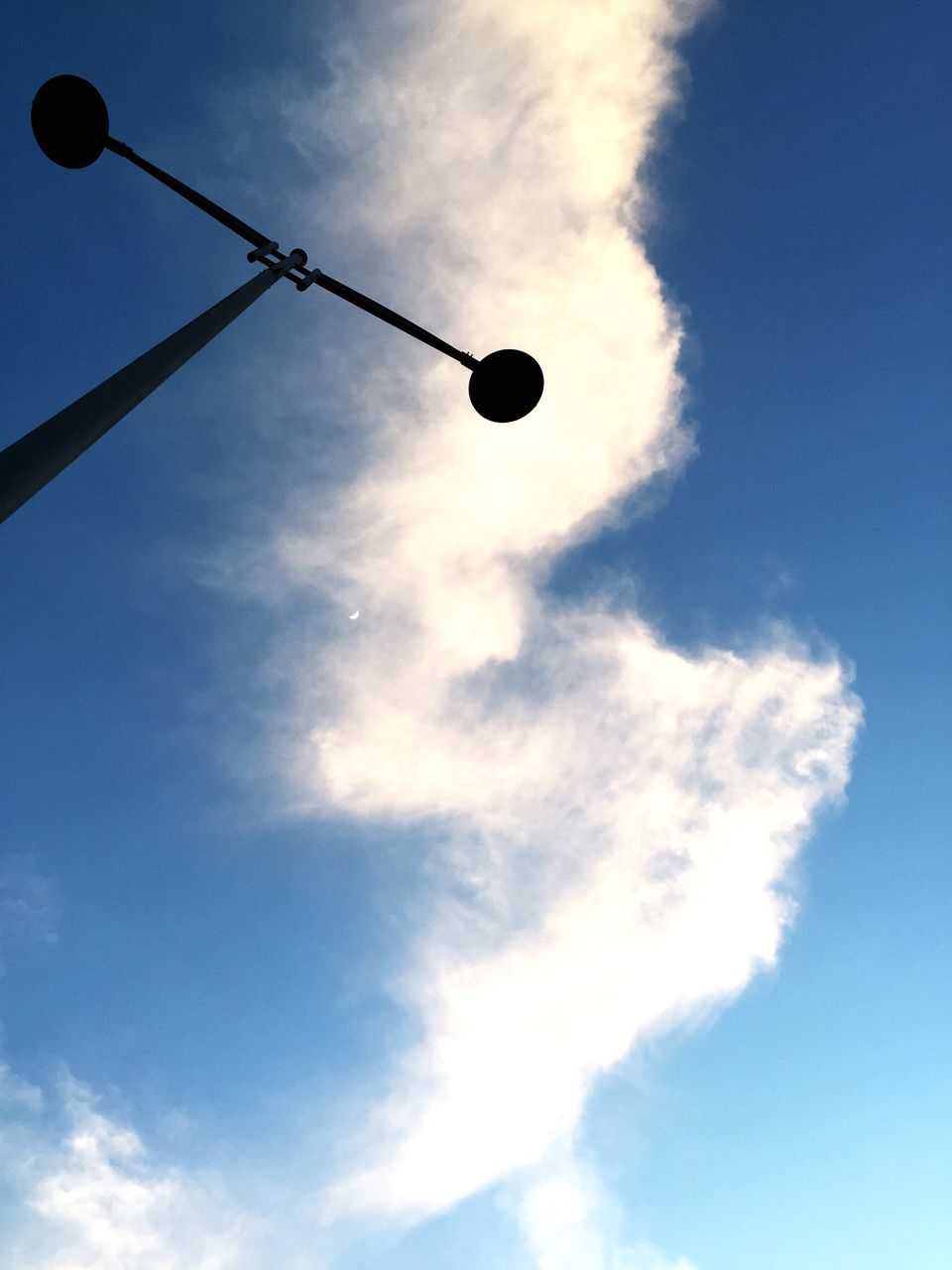 low angle view, sky, street light, lighting equipment, cloud - sky, flying, mid-air, moon, cloud, outdoors, cloudy, balloon, dusk, nature, no people, electricity, silhouette, blue, hot air balloon, electric light