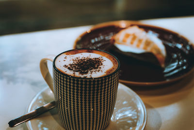 High angle view of coffee on table