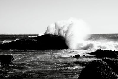 Waves splashing on rocks