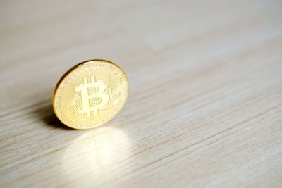 Close-up of coins on table