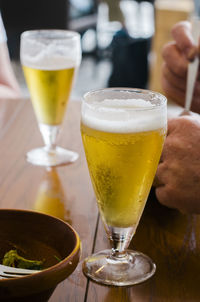 Close-up of beer in glass on table