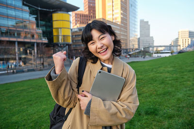 Young woman using mobile phone