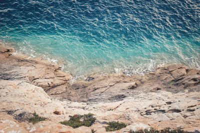 High angle view of rocks on beach