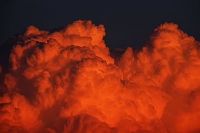 Low angle view of orange sky at night