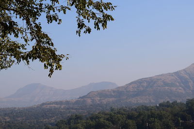 Scenic view of mountains against clear sky