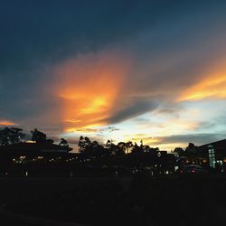 Silhouette of building at sunset