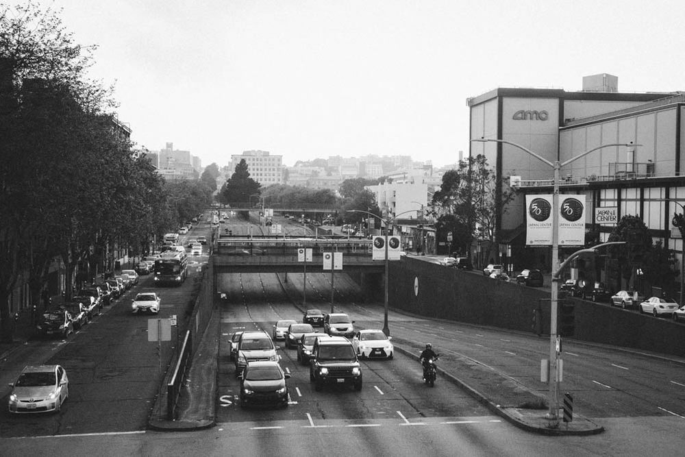 TRAFFIC ON ROAD IN CITY