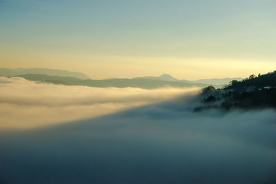 Scenic view of mountains against sky during sunset