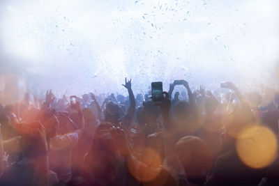 Crowd enjoying at music concert