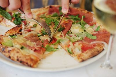 Close-up of hand holding food