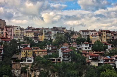 High angle view of residential buildings against sky