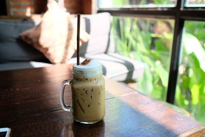 Close-up of coffee served on table