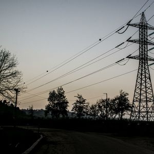 Electricity pylons at sunset