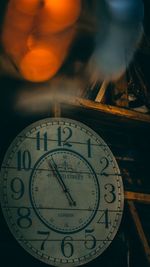 Close-up of clock on table