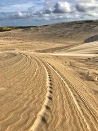 Scenic view of desert against sky