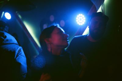 Man in illuminated nightclub