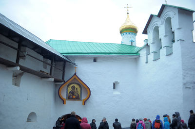 Group of people in front of building