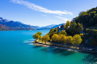 Scenic view of lake against blue sky